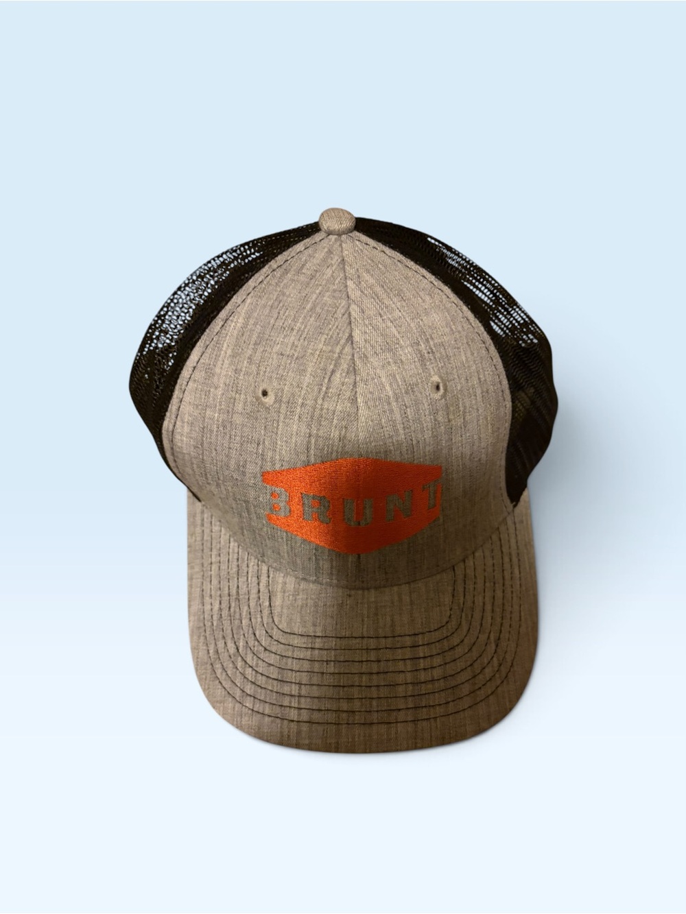 Brunt Men’s Tan Front Black Mesh Trucker Hat with Orange Logo